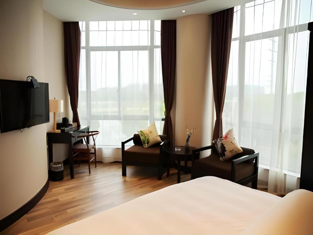 Jinjiang Metropolo Hotel - Liyang Tianmu Lake Чанчжоу Экстерьер фото